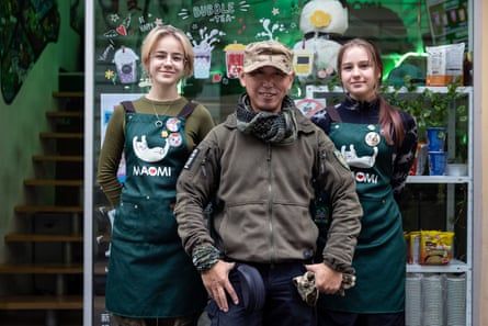 Brother Dong with the employees of the Maomi cafe in Lviv