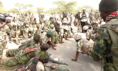 Soldiers prepare to take part in a mission against Boko Haram in Damask, Borno State, Nigeria