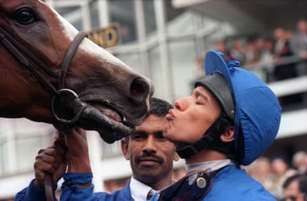 Frankie Dettori kisses his mount, Mark of Esteem, after their triumph in the Queen Elizabeth II Stakes, one of the winner’s in Dettori’s record-breaking afternoon at Ascot in September 1996.