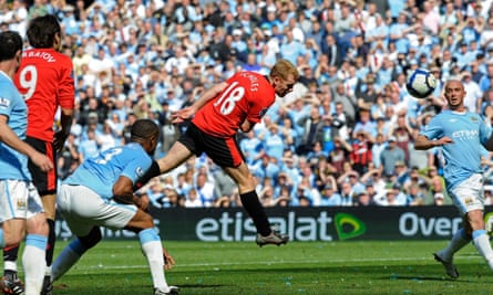 Paul Scholes heads a late winner against Manchester City in April 2010.
