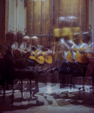 Fado performance at Mesa de Frades in Alfama. On the left sits Joel Piña, the 99-year-old musician credited with introducing the acoustic bass to fado. As a long-time collaborator of Amália Rodrigues, he is considered a living legend in fado circles.