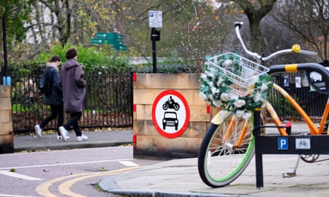 A bicycle in front of the entrance to a low-traffic neighbourhood in London