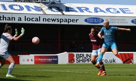 Bethany England of Tottenham scores against West Ham in May