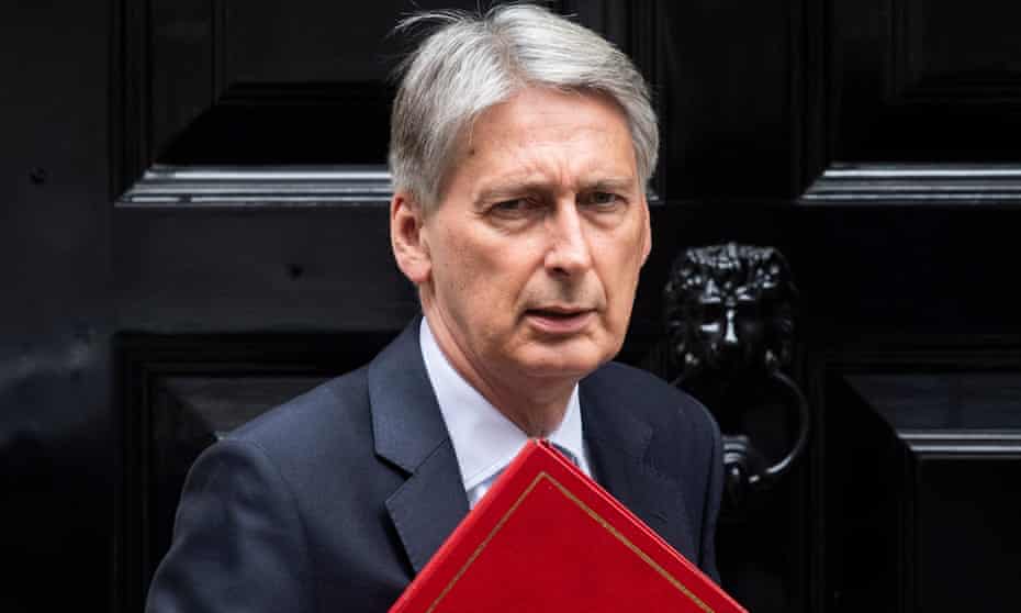 Philip Hammond leaves No 11 Downing Street