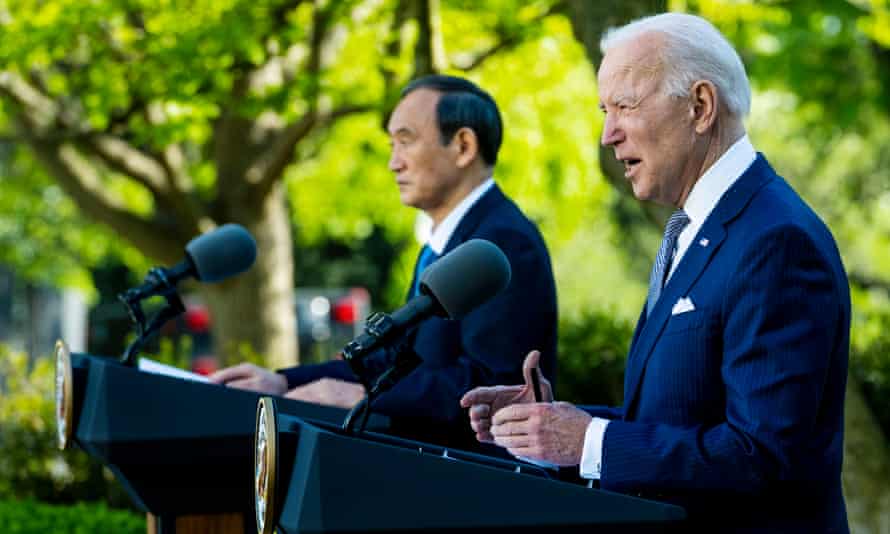 Joe Biden and Yoshihide Suga, the Japanese prime minister, in the Rose Garden of the White House on 16 April.
