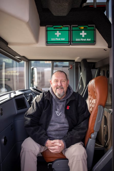 A smiling Steve Gibson photographed in a coach