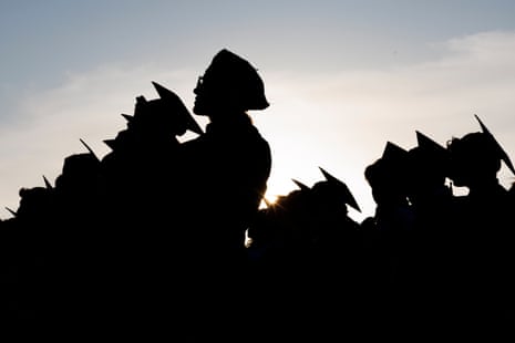 a silhouette of people