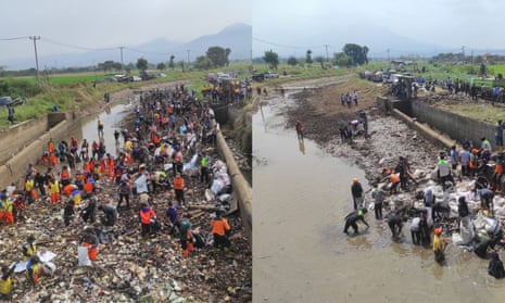 Hundreds join Indonesian TikTok group Pandawara in cleaning up a dam in Bandung, West Java on 26 July