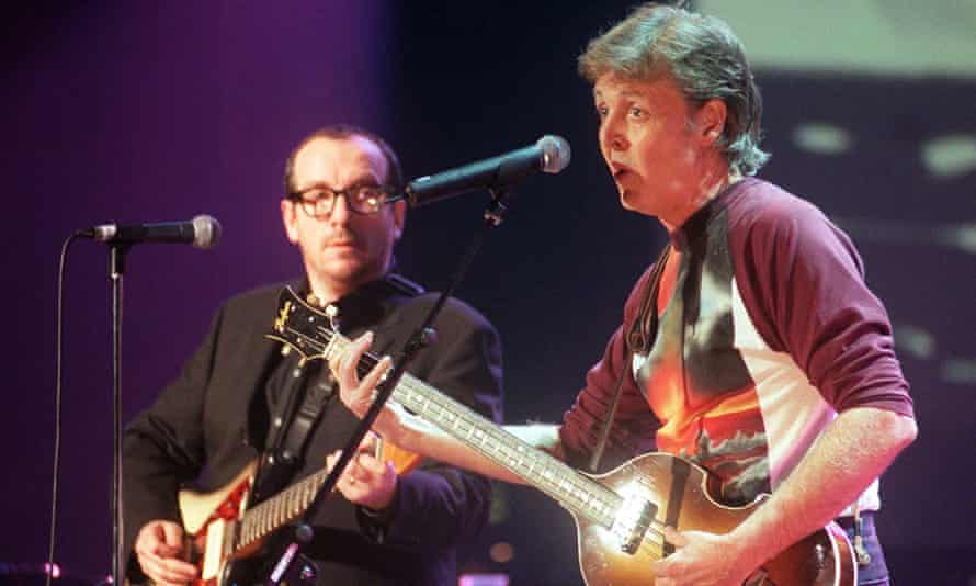 Costello with Paul McCartney in 1999.