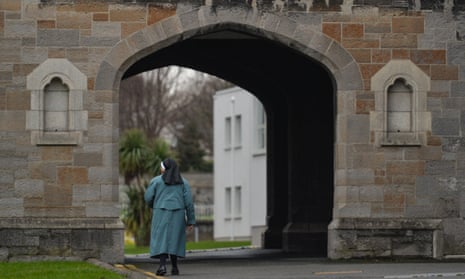 A nun walking at the site of a former Sisters of Charity Magdalene laundry in Donnybrook, Dublin, 2021