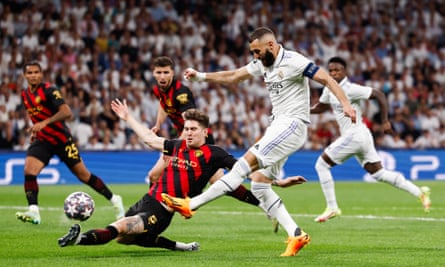 Karim Benzema of Real Madrid shoots during the Champions League semi-final first leg match against Manchester City.