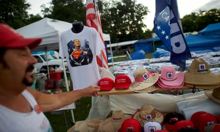 Vendor Tony Varano, 69, sells Trump T-shirts and flags, and countless tractor T-shirts at the Jacktown Tractor Engine Show in Jacktown, Pennsylvania on 15 July 2017.
