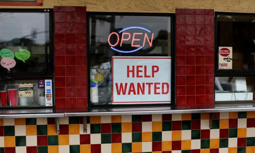 A help wanted sign at a taco stand in Solana Beach, California