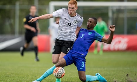 Melayro Bogarde tackles Germany’s David Hummel while playing for Netherland Under-15s