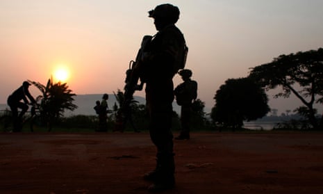 A French soldier takes position at daybreak in the Central African capital, Bangui