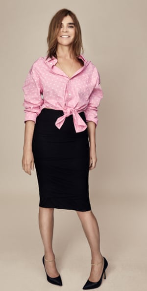 Carine Roitfeld wears shirt by Balenciaga; skirt by Tom Ford; shoes by Manolo Blahnik; ankle bracelets by Venyx.