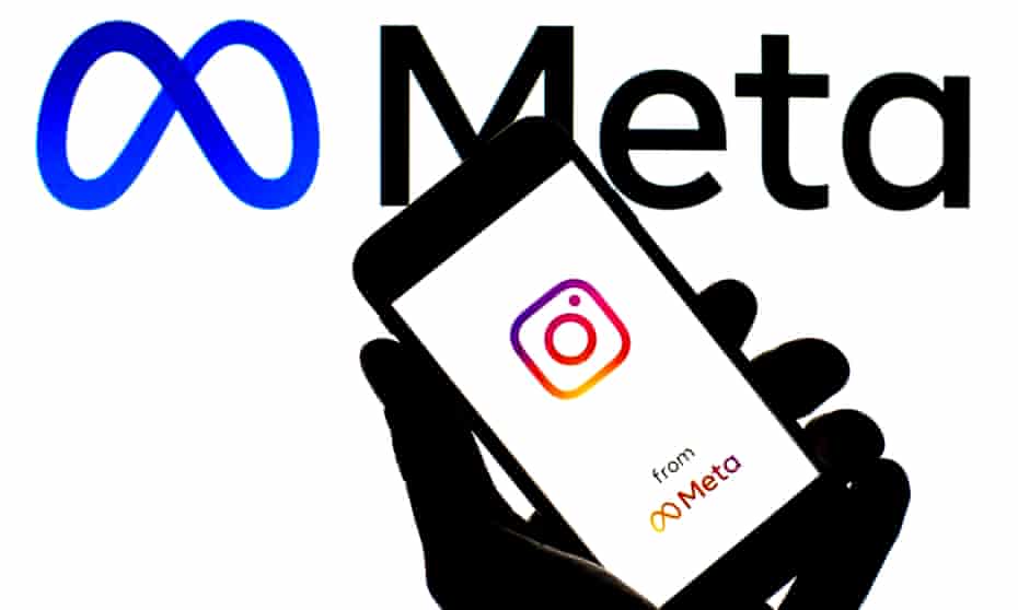 An instagram logo is displayed on a smartphone with a Meta logo in the background