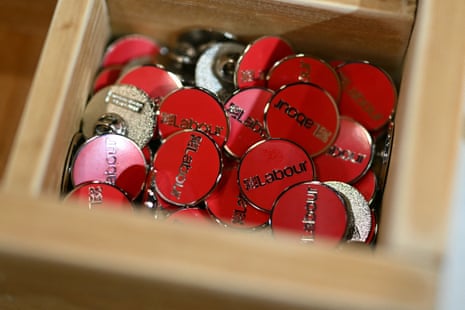 Pin badges are displayed for sale in the Labour party shop inside the exhibition centre, the venue for the annual Labour party conference in Liverpool.