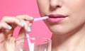 Close up of woman drinking with strawD6H1K9 Close up of woman drinking with straw