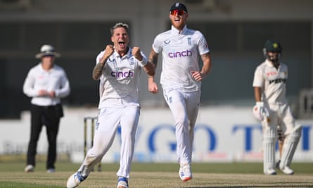 England bowler Brydon Carse celebrates with captain Ben Stokes after taking the wicket of Saud Shakeel