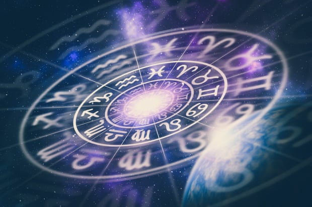 Astrological zodiac signs inside of horoscope circle on universe background.