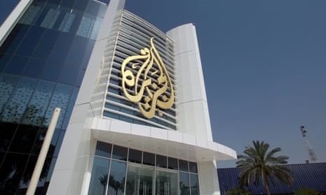 Al Jazeera headquarters with logo on building