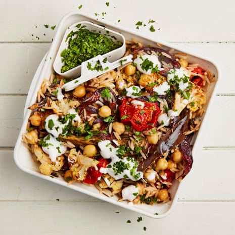 Meera Sodha’s recipe for wild rice, chickpea and aubergine salad with tamarind and ‘yoghurt’ dressing.