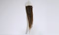 A single feather from a huia bird that has sold at Webb’s Auction House in Auckland for a record-breaking price.