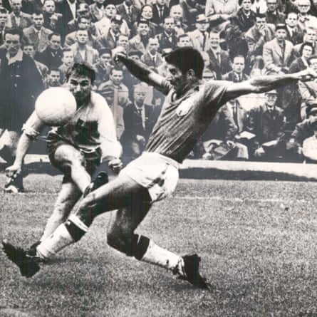 Sweden’s Kurt Hamrin shoots past Brazil’s Nilton Santos during the 1958 World Cup Final.