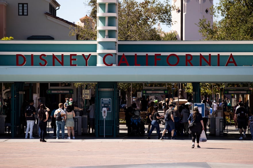 Visitors arrive at Disneyland California for the reopening of the amusement park in Anaheim.