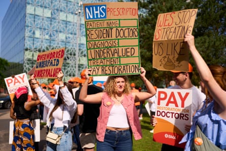 they hold up cardboard signs
