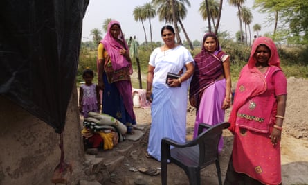 Phoolbati with health workers Lata Nayar and Vimla Gochar, and a villager.