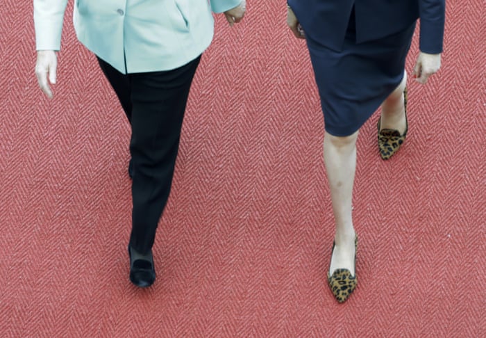 theresa may visits angela merkel in