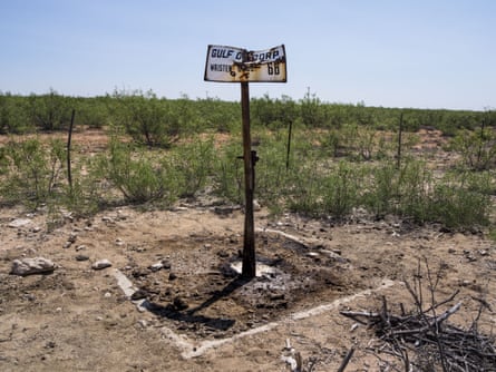 A plugged and abandoned oil well once owned by Gulf Oil, later acquired by Chevron, leaks contaminants to the surface at a cattle ranch in Crane County, Texas. Millions of defunct wells are aging by the day and increasingly springing leaks.
