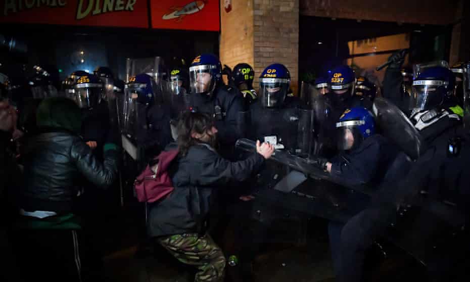Police clear demonstrators at Friday’s protest in Bristol.