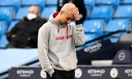 Pep Guardiola cuts an unhappy figure during Manchester City’s 2-0 defeat by Manchester United
