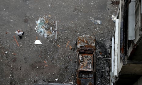 A damaged car is seen at shelled Severnaya Saltyvka residential area, as Russia’s attack on Ukraine continues, in Kharkiv, Ukraine May 26, 2022.