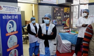 Health officials prepare for the start of the dry run or a mock drill for Covid-19 coronavirus vaccine delivery at a primary health center in New Delhi, India.