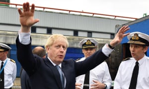 Prime Minister Boris Johnson gestures as he visits HMS Victorious at HM Naval Base Clyde on July 29, 2019 in Faslane, Scotland.
