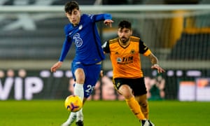 Chelsea’s Kai Havertz (left) holds off Ruben Neves of Wolves on 15 December.