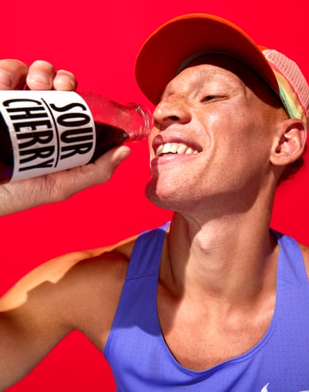 Picture of a man dressed as an athlete drinking sour cherry juice