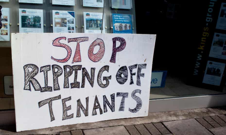 A placard protesting high rents outside an estate agent in Haringey, London, 2012.