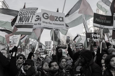 Protesters waving Palestinian flags and holding placards with slogans such as “Ceasefire Now!”, “Free Palestine” and “Gaza: stop the massacre”