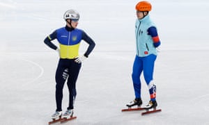 Short track speed skaters Semyon Yelistratov (R) of the ROC Team and Oleg Gandei of Ukraine train at the Capital Indoor Stadium ahead of the 2022 Winter Olympic Games.