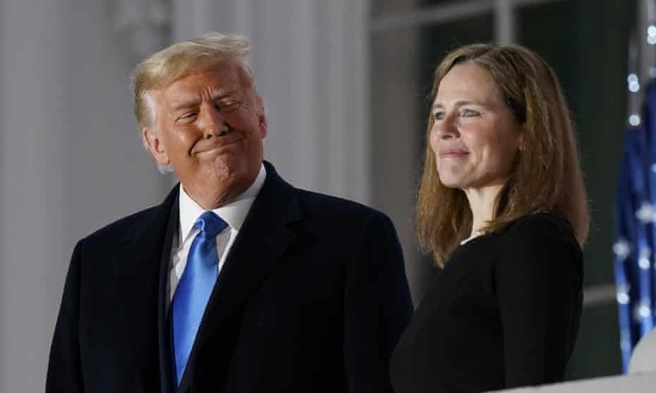 Donald Trump with Amy Coney Barrett after her swearing-in.