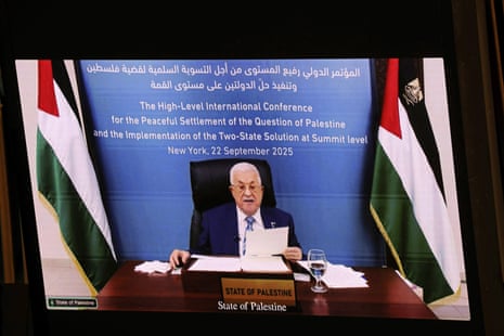 Palestinian Authority President Mahmud Abbas is displayed on a screen as he speaks remotely during the UN general assembly in New York on 22 September 2025.
