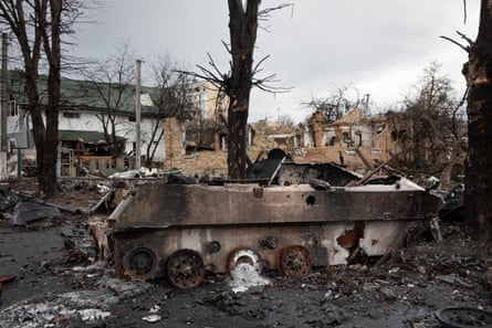 Destroyed Russian military vehicles in a heavily damaged neighbourhood of Bucha