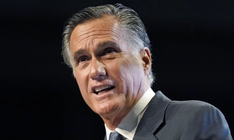 Mitt Romney addresses the Utah Republican party convention, where he was booed by many delegates.