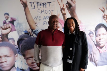 Oupa Moloto, who took part in the Soweto uprising on June 16 1976 as a student protester, and his daughter Mpho, at the June 16 Memorial Acre in Jabavu, Soweto.