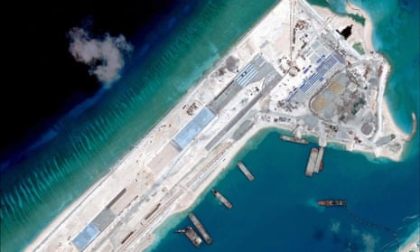 Satellite image of what is claimed to be an under-construction airstrip at Fiery Cross Reef in the Spratly islands in the disputed South China Sea. 